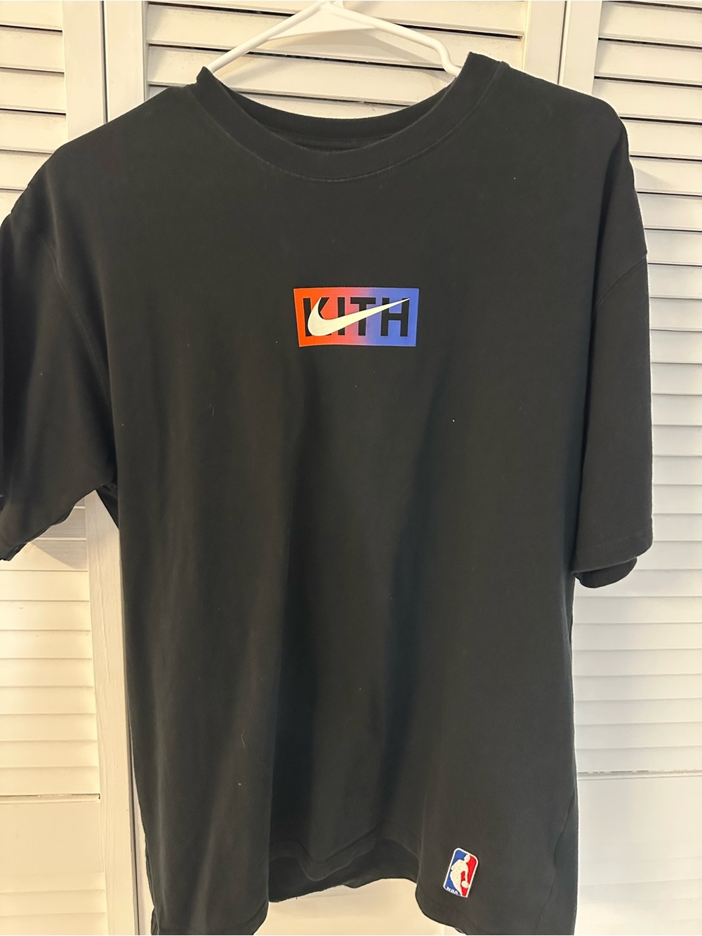 Nike Black Short-Sleeve Tee with Gradient Orange-to-Blue Logo